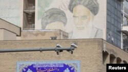 FILE - CCTV cameras are seen in a street in Tehran, Iran, April 9, 2023. (Majid Asgaripour/West Asia News Agency via Reuters)