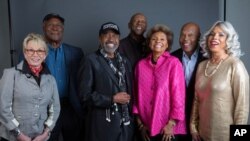 FILE - The original cast of Roots, Sandy Duncan, John Amos, Ben Vereen, Louis Gossett Jr., Leslie Uggams, Georg Stanford Brown and Lynne Moody pose for a portrait in New York, May 11, 2016.