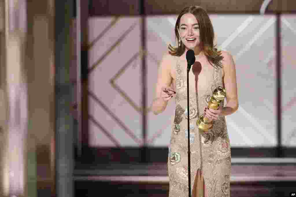 This image released by CBS shows Emma Stone accepting the award for best female actor in a motion picture for her role in &quot;Poor Things&quot; during the 81st Annual Golden Globe Awards in Beverly Hills, Calif., on Jan. 7, 2024.&nbsp;