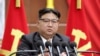 Pemimpin Korea Utara Kim Jong Un menyampaikan pidato pada rapat pleno akhir tahun Partai Pekerja yang berkuasa, yang diadakan antara 26 Desember dan 30 Desember 2023, di Pyongyang, Korea Utara. (Foto: KCNA melalui AP)