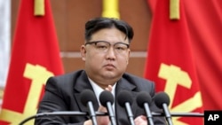 FILE - In this photo provided by the North Korean government, North Korean leader Kim Jong Un delivers a speech during a year-end plenary meeting of the ruling Workers’ Party, which was held between Dec. 26, and Dec. 30, 2023, in Pyongyang, North Korea. 