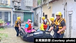 美台风带来强降雨，台湾多地现淹水灾情，在登陆中国之后威力仍不减。（台湾国防部提供，2024年7月26日）