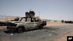 Destroyed military vehicles are seen in southern in Khartoum, Sudan, April 20, 2023. 