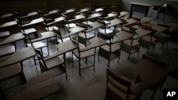 FILE - A classroom sits empty at the Central University of Venezuela (UCV) in Caracas, Venezuela, July 7, 2021. 