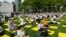 Participants practice poses at the 9th International Day of Yoga event at the United Nations, June 21, 2023. (Margaret Besheer/VOA) 