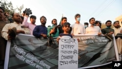 FILE - Protesters demonstrate against the death in prison of a writer who was arrested on charges of violating the Digital Security Act, in Dhaka, Bangladesh, on Feb. 26, 2021. A proposed Cyber Security Act, to be voted on in September 2023, is intended to replace the DSA.