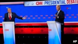 Wagombea urais Marekani 2024 Donald Trump na Joe Biden wakiwa katika mdahalo wa CNN huko Atlanta, Georgia 06.27.2024.