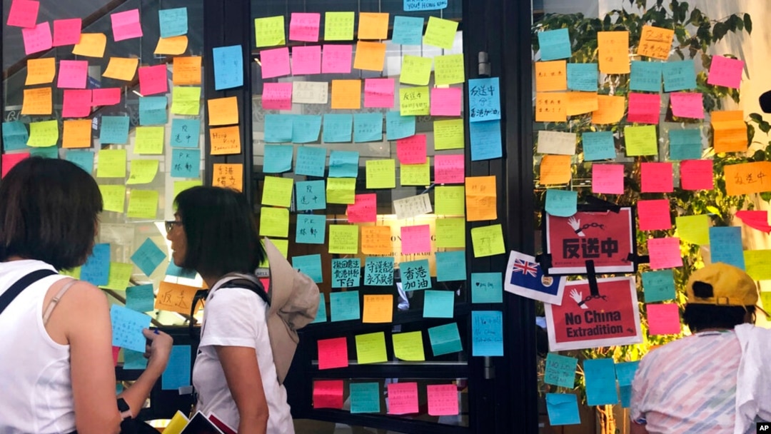 FILE - Protesters leave notes in front of the Hong Kong Economic and Trade Office in San Francisco, June 9, 2019. Hong Kong activists on May 23, 2024, called on U.S. lawmakers to close the office, as well as ones in Washington and New York.