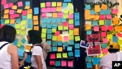 FILE - Protesters leave notes in front of the Hong Kong Economic and Trade Office in San Francisco, June 9, 2019. Hong Kong activists on May 23, 2024, called on U.S. lawmakers to close the office, as well as ones in Washington and New York.