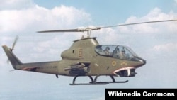 FILE - The Bell AH-1 Cobra is a single-engine attack helicopter, shown here in flight on April 13, 2019. Nigerian military leaders said on June 19, 2024, that the country plans to receive 50 new aircraft, some of which are AH-1 attack helicopters. (U.S. Army)