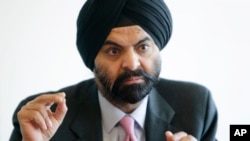 FILE - MasterCard CEO Ajay Banga speaks to reporters in New York, April 6, 2011.