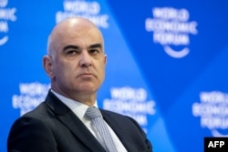 Swiss President Alain Berset looks on during a session of the World Economic Forum (WEF) annual meeting in Davos, Switzerland, Jan. 17, 2023.