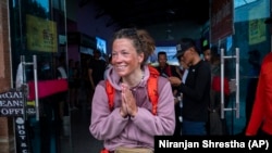 Norwegian climber Kristin Harila, 37, arrives after summiting Annapurna in Kathmandu, Nepal, Tuesday, June 6, 2023. The Norwegian is aiming to be the fastest climber to scale all the world's 14 highest mountains. (AP Photo/Niranjan Shrestha)