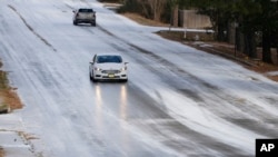 Dangerously cold temperatures affected much of Mississippi with areas reporting accumulation of snow and ice, as seen on this north Jackson street. Deep South states like Mississippi, Louisiana and Arkansas joined portions of the Rockies, Great Plains, Midwest and New England in reporting storms and frigid temperatures.