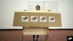 Election workers prepare polling stations in Caracas, Venezuela, July 26, 2024. The presidential election is set for July 28.