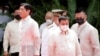 资料照：菲律宾前总统杜特尔特（右二）在马尼拉出席菲律宾现总统小马科斯(Ferdinand Marcos Jr)（左前）的就职典礼。 （2022年6月30日）