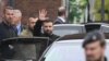 Ukraine's President Volodymyr Zelenskyy waves as he wraps up his trip to Germany before heading to France, in Aachen, Germany, May 14, 2023.