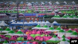 Perkemahan Jambore Pramuka Dunia di Buan, Provinsi Jeolla Utara pada 5 Agustus 2023. Pramuka Amerika dan Inggris menarik diri dari Jambore Pramuka Dunia di Korea Selatan, dengan alasan suhu yang sangat panas. (Foto: AFP)