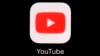 FILE - The YouTube app is displayed on an iPad in Baltimore on March 20, 2018. 