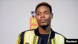 FILE: Rapper Fetty Wap poses backstage during the 2015 MTV Movie Awards in Los Angeles, California on April 12, 2015. 