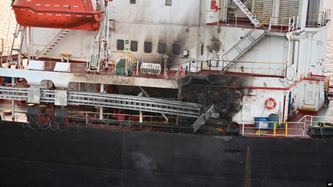 FILE - This photo shows the U.S.-owned Genco Picardy that was attacked Jan. 17, 2024, with a drone launched by Houthis in the Gulf of Aden. The International Rescue Committee is now diverting aid shipments away from the Red Sea. (Indian navy via AP)