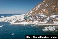 This June, 2024, photo by filmmaker Bjorn Olson and provided by Opik Ahkinga, shows the town Inalik, located on the west coast of Little Diomede Island in the Bering Strait, the most remote community in the U.S.