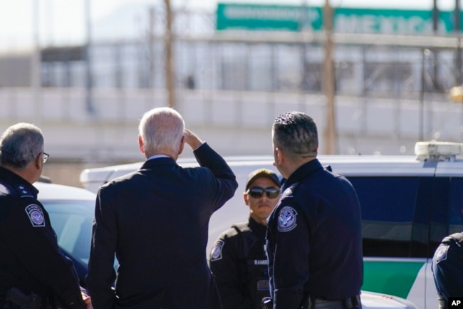 FILE - U.S, President Joe Biden looks toward a large