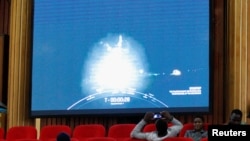 A monitoring screen shows the preparation of the launch of Kenya's first operational 3U Earth observation satellite, the Taifa-1, at the University of Nairobi's Taifa Hall, in Nairobi, Kenya, April 14, 2023. 