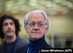 Gerard Mourou, Nobel Prize in Physics 2018 laureate is pictured inside the the "Extreme Light Infrastructure-Nuclear Physics"- ELI-NP laser in Magurele city near Bucharest, Romania, March 26, 2024. (Photo by Daniel MIHAILESCU / AFP)