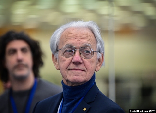 Gerard Mourou, Nobel Prize in Physics 2018 laureate is pictured inside the the "Extreme Light Infrastructure-Nuclear Physics"- ELI-NP laser in Magurele city near Bucharest, Romania, March 26, 2024. (Photo by Daniel MIHAILESCU / AFP)