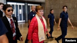 FILE - Managing Director of the International Monetary Fund (IMF) Kristalina Georgieva walks after attending an interview at the International Media Center (IMC), on the second day of the G20 summit in New Delhi, Sept. 10, 2023. 