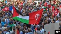"Le peuple veut pénaliser la normalisation" avec Israël, ont notamment scandé les manifestants.