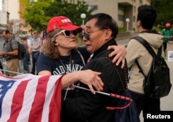 Supporters of Republican presidential candidate and former U.S. president Donald Trump react to hearing a verdict in Trump's criminal trial over charges that he falsified business records, in New York City, May 30, 2024.