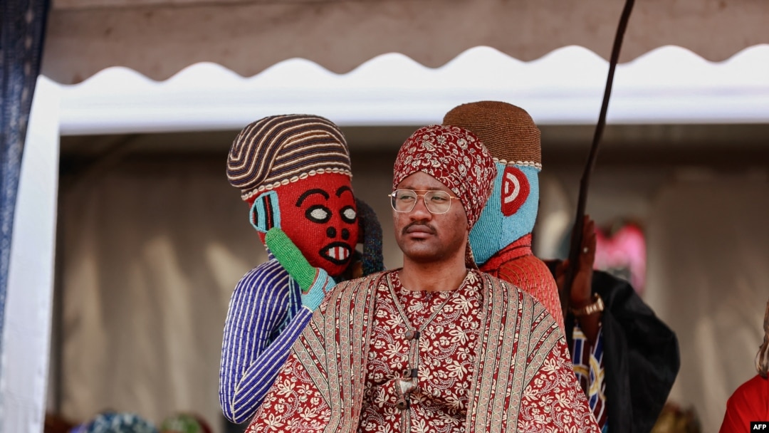 Mouhammad-Nabil Mfonrifoum Mbombo Njoya (C), Sultan King of the Bamouns, sits on his throne while attending the inauguration ceremony of the new Bamoun Kings Museum in Foumban, on April 13, 2024. 