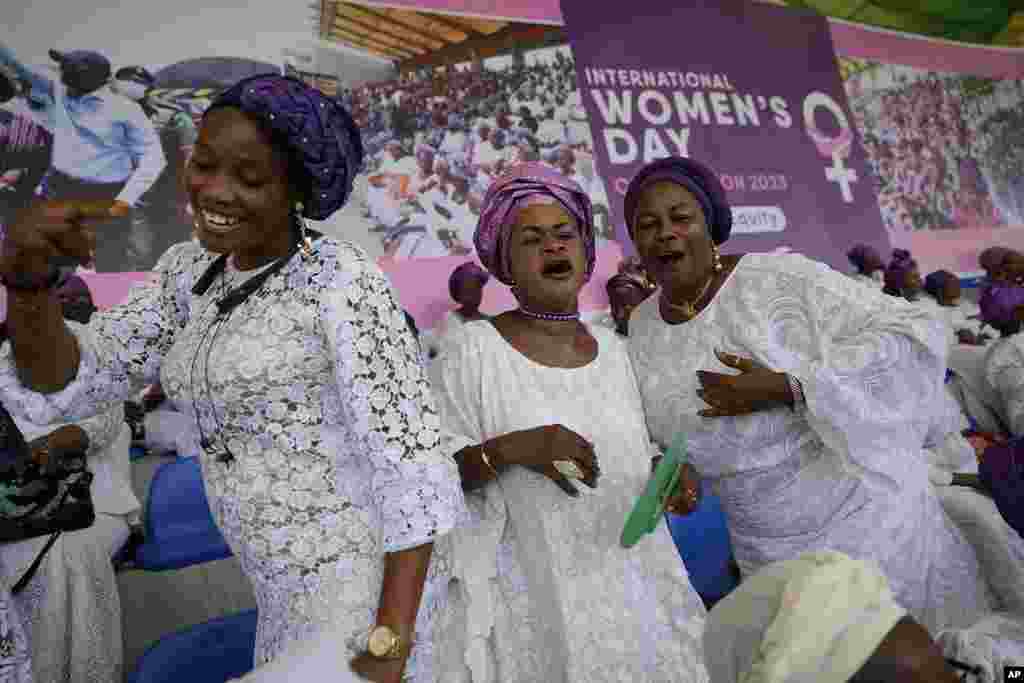 Women sing and dance during the International Women&#39;s Day celebration at the Mobolaji Johnson Stadium in Lagos, Nigeria, Wednesday, March 8, 2023.&nbsp;