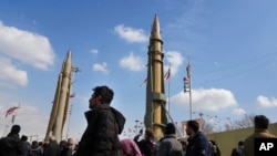 Domestically built missiles are displayed during the annual rally commemorating Iran's 1979 Islamic Revolution, in Tehran, Iran, Feb. 11, 2023.