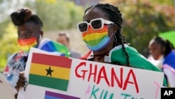 FILE—Wilhemina Nyarko attends a rally against a controversial bill being proposed in Ghana's parliament that would make identifying as LGBTQ+ or an ally a criminal offense punishable by up to 10 years in prison, in the Harlem neighborhood of New York on Monday, Oct 11, 2021.