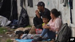 Central American migrants camp out near the Northern Bus Station in Mexico City, Sept. 22, 2023, during their journey north to the US.