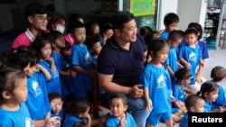 Vacharaesorn Vivacharawongse, 42, the second-eldest son of Thailand's King Maha Vajiralongkorn visits the Foundation for Slum Child Care supported by the Royal Family, in Bangkok, Thailand, Aug. 8, 2023.