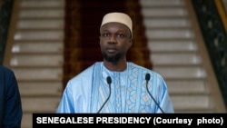 This handout picture taken an distributed by the Senegalese Presidency on April 5, 2024 shows Senegalese Prime Minister Ousmane Sonko addressing the press ahead of the announcement of the list of the ministers at the Presidential Palace in Dakar.