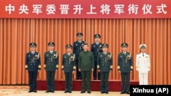 中共中央军委主席习近平晋升新任火箭军司令员王厚斌（左上）与火箭军政委徐西盛（右上）兩人为上將。（2023年7月31日）