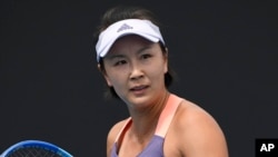 FILE - China's Peng Shuai reacts during her first round singles match against Japan's Nao Hibino at the Australian Open tennis championship in Melbourne, Australia, on Jan. 21, 2020. 