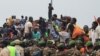 Thousands of Nigerians gather in front of the French army headquarters, in support of the putschist soldiers and to demand the French army to leave, in Niamey, Niger, Sept. 2, 2023. (Mahamadou Hamidou/Reuters)