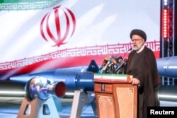 Iranian President Ebrahim Raisi speaks during the unveiling ceremony of the new ballistic missile called Fattah, in Tehran, Iran, June 6, 2023. (IRGC/WANA/Handout via Reuters)