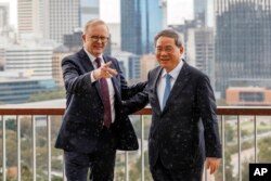 澳大利亞總理阿爾巴尼斯與中國總理李強在珀斯參觀。(2024年6月18日)