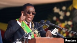 FILE - Zimbabwe President Emmerson Mnangagwa speaks during his inauguration at the National Sports Stadium in Harare, Sept. 4, 2023. In his new year message Mnangagwa has predicted the country's economy will turn around this year following the recent discovery of oil and gas. 