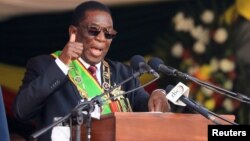 FILE: Zimbabwe President Emmerson Mnangagwa speaks during his inauguration at the National Sports Stadium in Harare, Sept. 4, 2023. 
