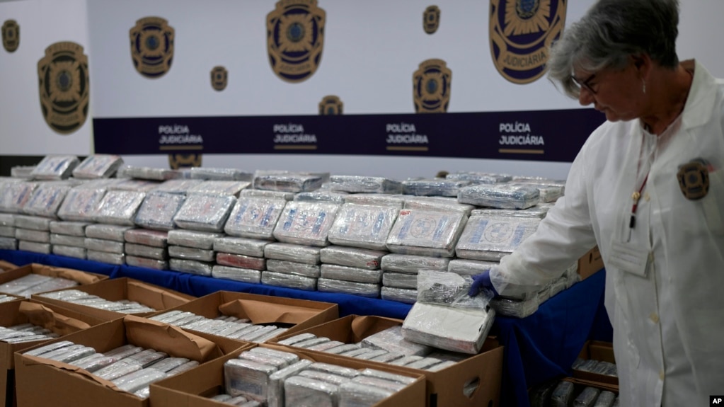 U.N. Report: Cocaine market is booming as meth trafficking spreads 2 FILE - Seized packets with cocaine are displayed for the media at the Portugal's police headquarters in Lisbon, May 2, 2023.