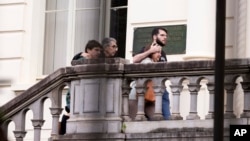 Plane crash victims' relatives arrive at the headquarters of the institute of legal medicine for the recognition of victims, in Sao Paulo, Brazil, Aug. 10, 2024. 