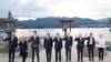 Leaders of G7 nations and European Commission President Ursula von der Leyen pose for a photo during a visit to the Itsukushima Shrine in Miyajima Island as part of the G7 Leaders' Summit in Japan, May 19, 2023.